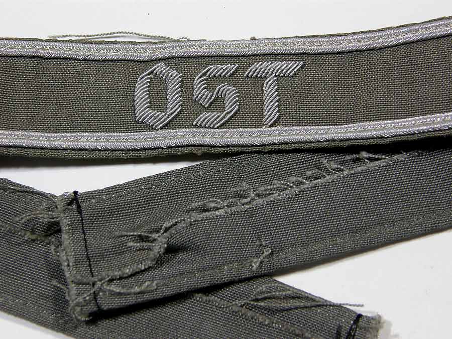 OST cufftitle in hand-embroidered aluminum wire with silver borders