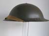 Mint un-issued British Army helmet dated 1942 and maker stamped.